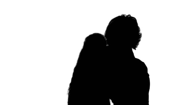Silhouette Cute family mother with child daughter taking selfie smart phone photo track matte - Fotografie, Obrázek