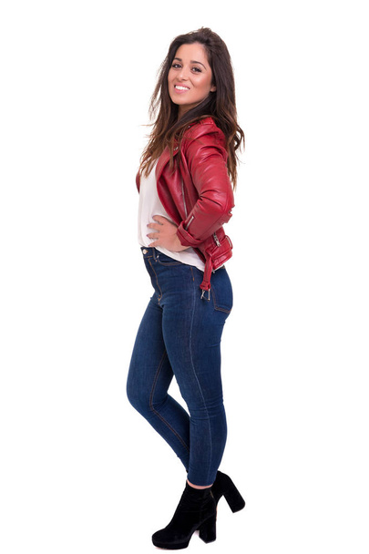 Studio shot of young casual woman on white background - Foto, imagen