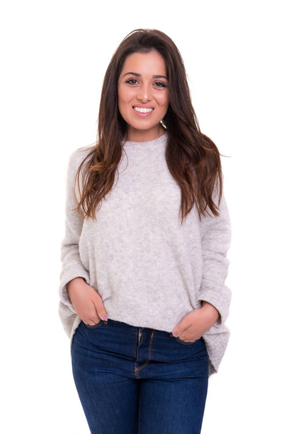 Studio shot of young casual woman on white background - Photo, image