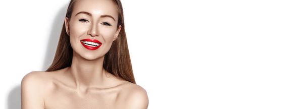 Sexy smiling woman with Glamour Red Lips, bright Makeup, clean Skin. Smile with White Teeth. Happy Fashion Girl on white background - Foto, imagen
