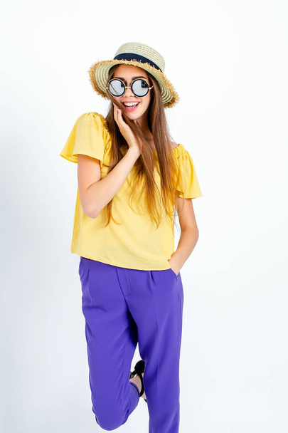Adorable model posing in hat and casual clothes - Zdjęcie, obraz