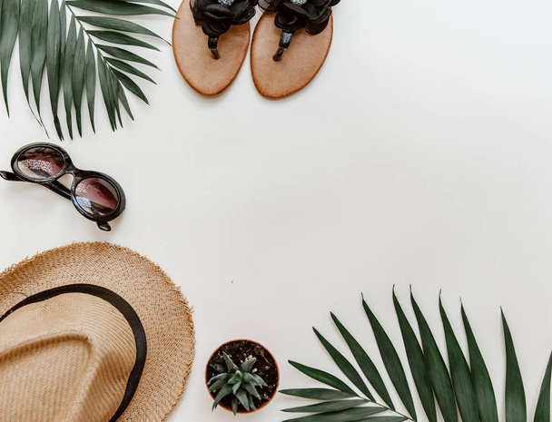 Flat lay summer composition. Creative concept tropical leaves and summer accessories. Top view, copy space - Fotó, kép