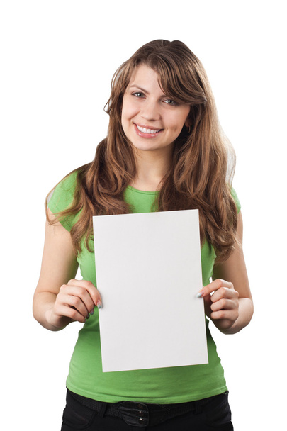 Smiling young woman holding a white blank card. - Fotografie, Obrázek