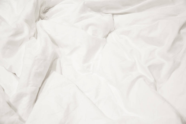 Close up of white bedding sheets soft focus and copy space. - Foto, imagen