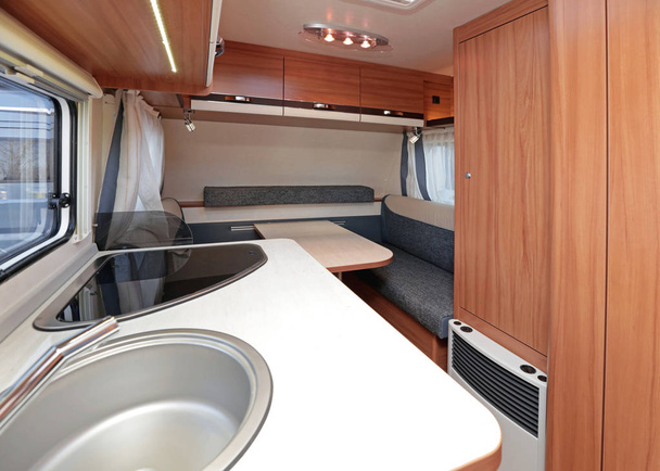 Kitchen Counter and Dining Tablein Camping Van Interior - 写真・画像