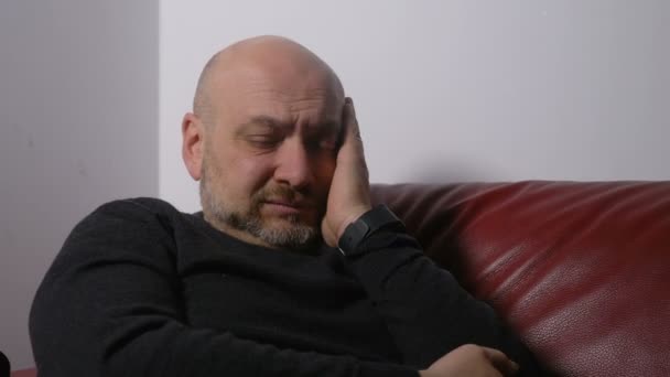 Depressed sad man alone crying. Portrait of upset man - Video