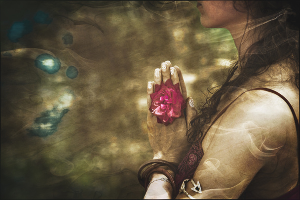 close up of yoga woman hands in namaste gesture with rose flower, vintage look  - Photo, Image