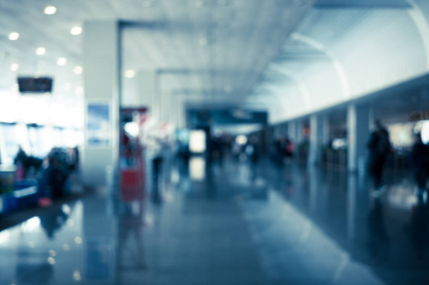 Blurred passenger in airport terminal. Interior background - Foto, Imagem