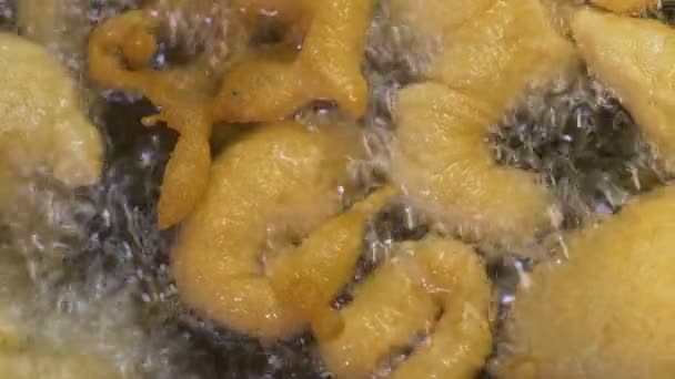 zeppole frying in hot oil - close up - South Of Italy - Video, Çekim