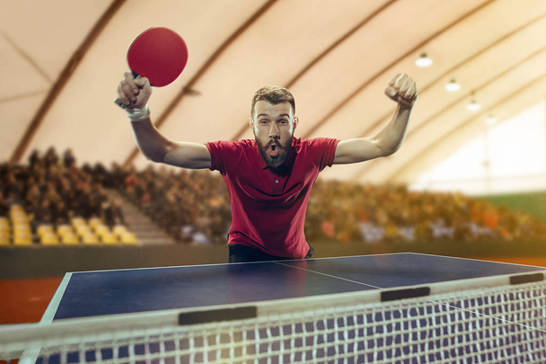 The table tennis player celebrating victory - Foto, Imagen