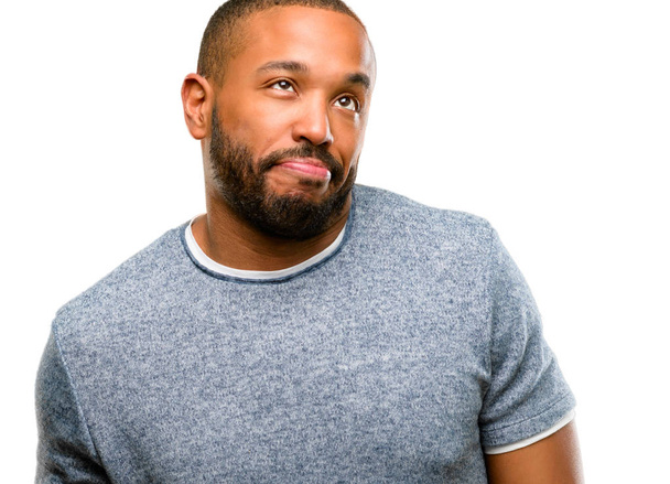 African american man with beard making funny face fooling isolated over white background - Photo, image