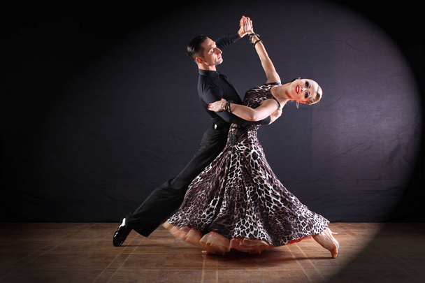 dancers in ballroom isolated on black background - Fotó, kép
