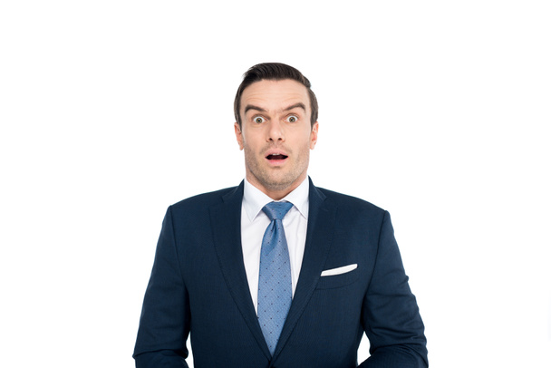 shocked middle aged businessman looking at camera isolated on white - Photo, image