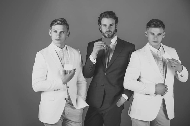 Banking services. Men wearing formal suits - Fotoğraf, Görsel