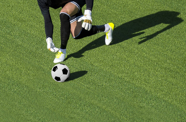 τερματοφύλακας ο άνθρωπος για να ρίξει ένα ποδόσφαιρο πεδίο - Φωτογραφία, εικόνα