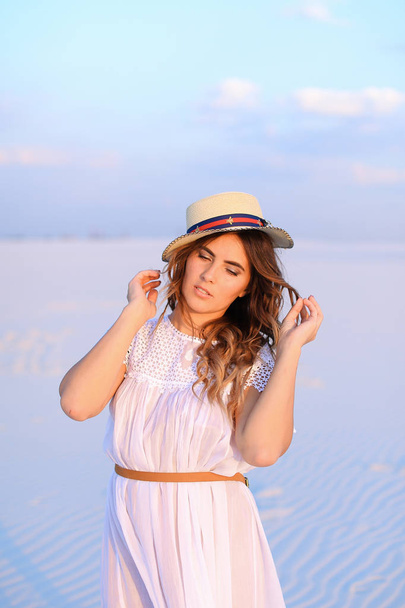 Young caucasian female person wearing white dress and hat standi - Photo, Image