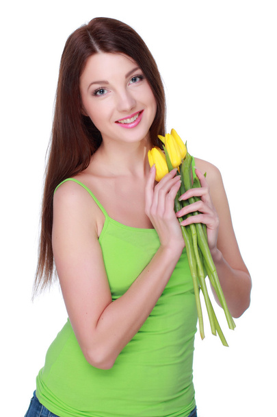 Счастливая девушка с желтыми тюльпанами
 - Фото, изображение