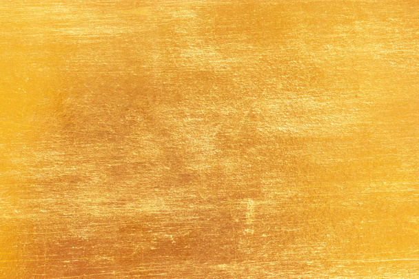 Gouden achtergrond of textuur en hellingen schaduw - Foto, afbeelding