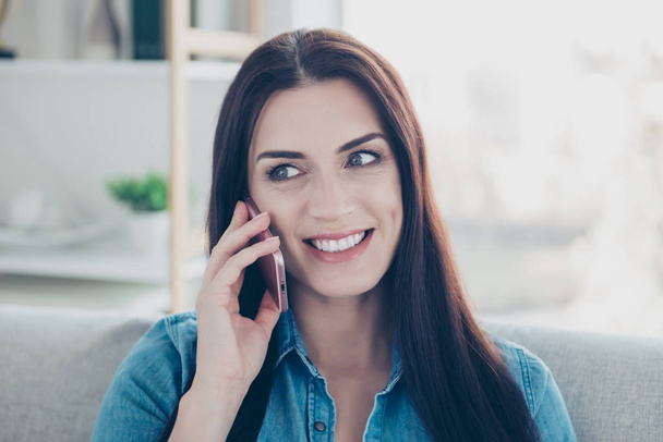 Head shot portrait of cheerful positive girl using smart phone speaking on cellphone with friend lover sitting indoor, having fun, technology concept - Fotoğraf, Görsel