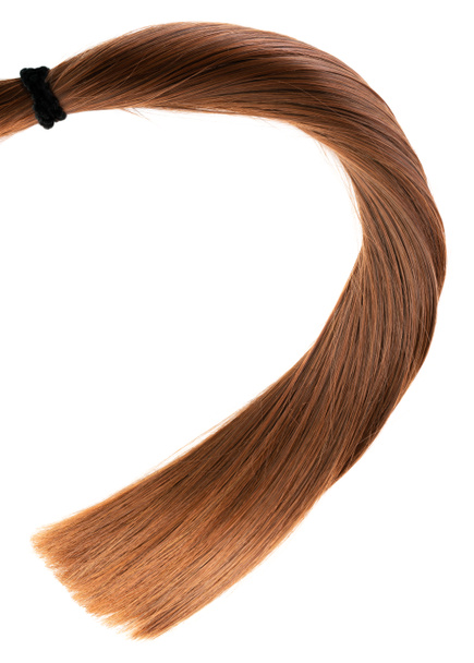 dlouho zdravé rovné hnědé vlasy ohonu na bílém pozadí - Fotografie, Obrázek