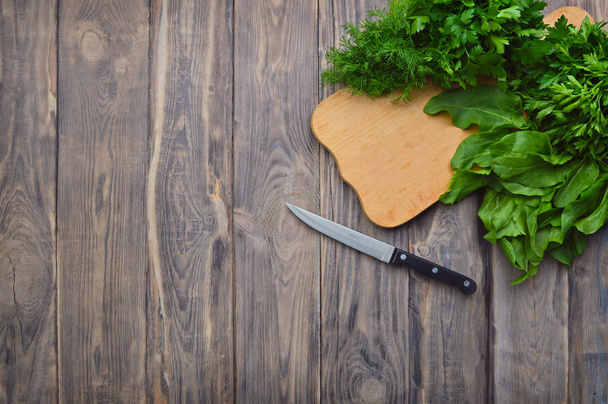 Organic  Parsley , dill, spinach, sorrel closeup on wood background, healthy vegetarian food ingredient. Fresh Parsley. Flat - lay. Top view. Food background. - 写真・画像