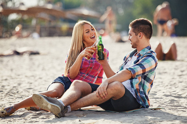 Happy couple enjoying Sunny day on the Danube river. - Фото, изображение