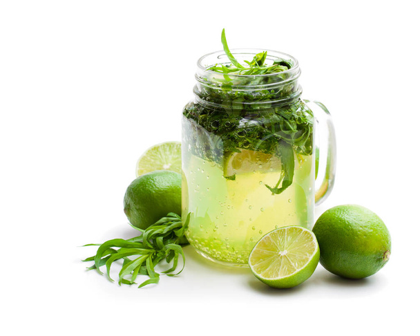 Green  lemonade with tarragon and lime isolated on white  - Foto, Imagem