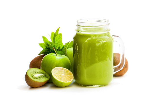 Fresh  smoothie with green fruits in a glass jar mug isolated on white  - Valokuva, kuva