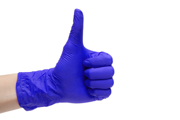 Like sign icon made of purple medical gloves. Hand finger up symbol. Thumbs up gesture. Isolated on white background - Foto, immagini