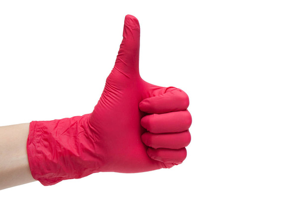 Als teken pictogram van rode medische handschoenen gemaakt. De vinger van de hand van het symbool. Duimschroef opwaarts gebaar. Geïsoleerd op witte achtergrond - Foto, afbeelding