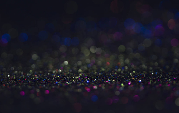Bokeh glitter sinek ve siyah arka plan ışığı - Fotoğraf, Görsel