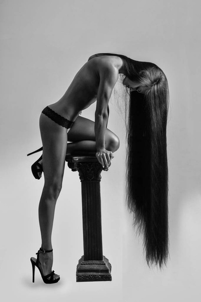 shampoo. hair care. Pretty sexy girl with long hair and naked body - 写真・画像
