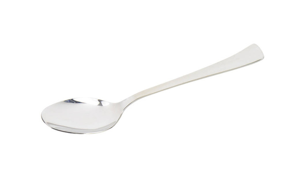Empty table spoon on white background - Photo, Image