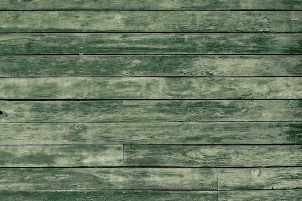 Old green toned shabby wooden planks with cracked color paint - Foto, immagini