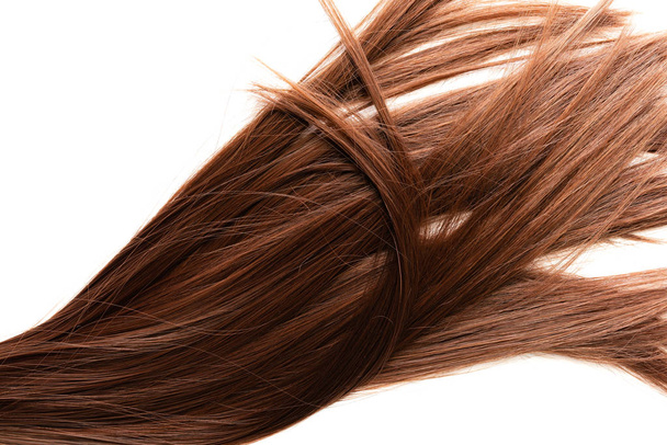 довге коричневе волосся на білому тлі
 - Фото, зображення
