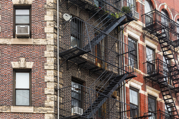 A fire escape of an apartment building in New York city - Photo, image