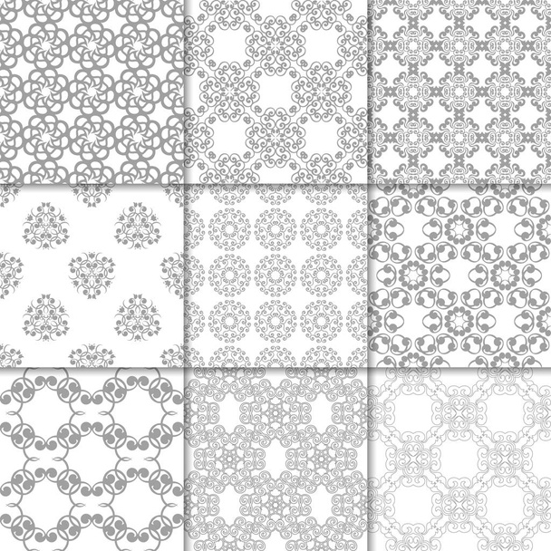 Grijze en witte bloemen ornamenten. Collectie van neutrale naadloze patronen voor papier, textiel - Vector, afbeelding