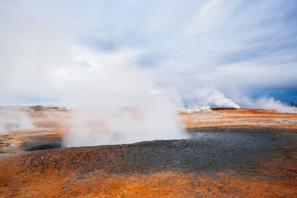 Landscape with eruption steam. Geothermal area Hverir, Iceland, Europe - Fotoğraf, Görsel