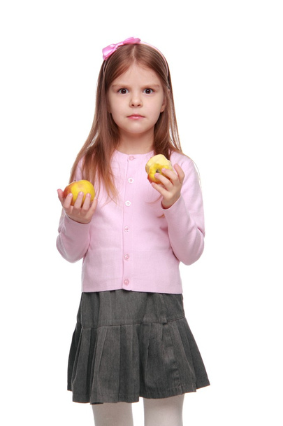Lovely school girl with apple - Фото, зображення