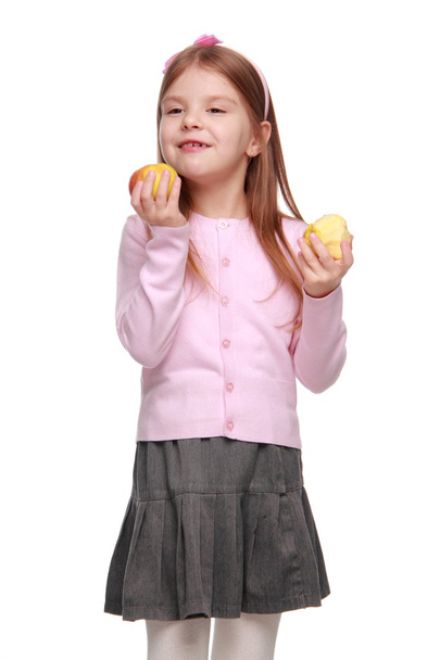 Lovely school girl with apple - Foto, Imagen