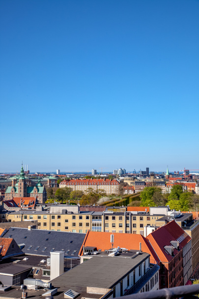 beautiful cityscape with old and modern buildings at sunny day in copenhagen, denmark - Foto, imagen