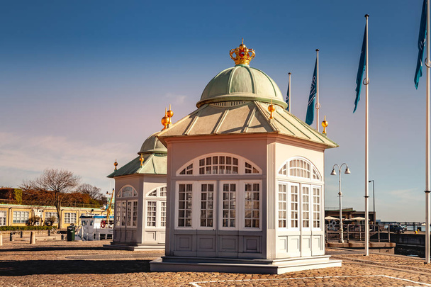 COPENHAGEN, DENMARK - MAY 6, 2018:  two buildings and flags on flag poles  - Valokuva, kuva
