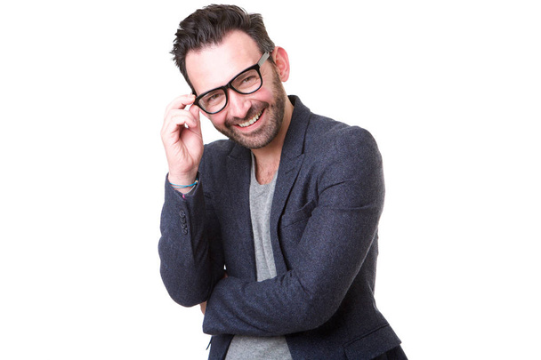 Portrait of attractive middle age man with glasses smiling against white background - Photo, Image