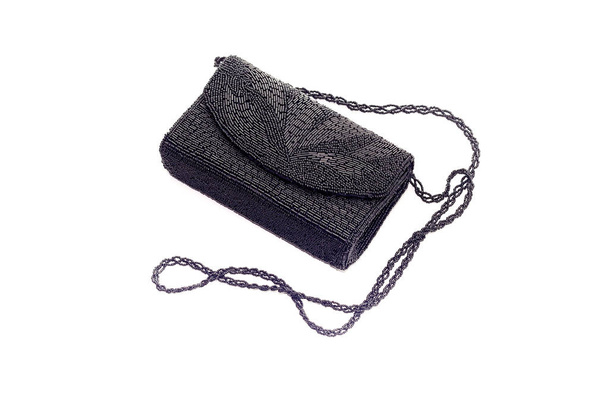 Bolso de mano negro, femenino y nuevo bordado con cuentas sobre fondo blanco
 - Foto, Imagen