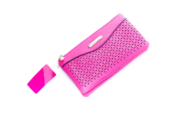 rosa, weiblich, neue Handtasche auf weißem Hintergrund Nahaufnahme - Foto, Bild