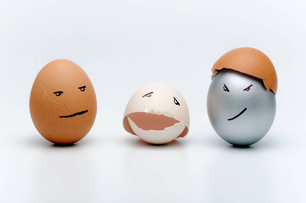 Painted eggs lie on a white table - Photo, Image