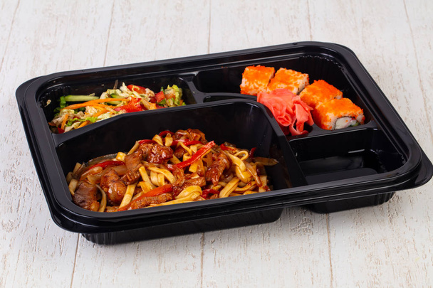 Bento set with roll, noodle and meat - Photo, Image