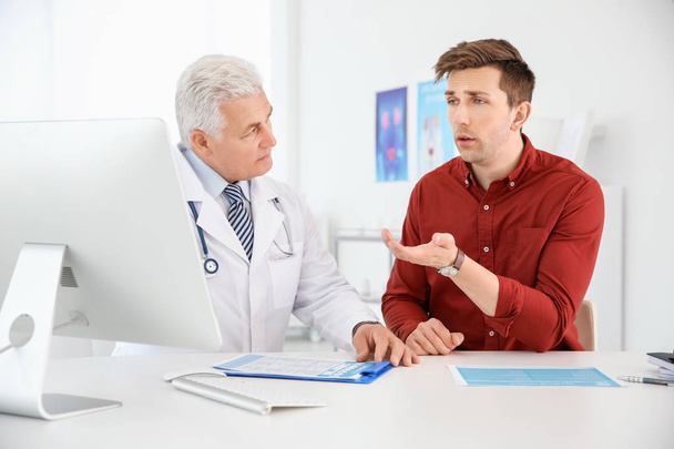 Man with health problems visiting urologist at hospital - Fotografie, Obrázek