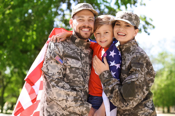 Happy military family with their son outdoors - Fotoğraf, Görsel