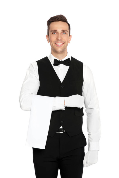 Portrait of handsome waiter in elegant uniform on white background - Foto, Bild